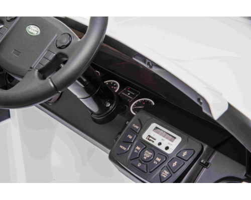 Дитяча акумуляторна машинка Land Rover Discovery Біла