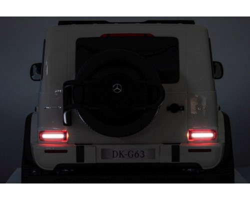 Дитяча акумуляторна машинка Mercedes Benz G63 AMG XXL Біла Дитяча акумуляторна машинка Mercedes Benz G63 AMG XXL Біла