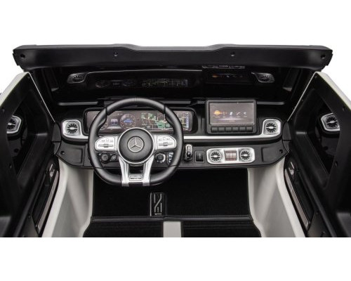 Дитяча акумуляторна машинка Mercedes Benz G63 AMG XXL Біла Дитяча акумуляторна машинка Mercedes Benz G63 AMG XXL Біла