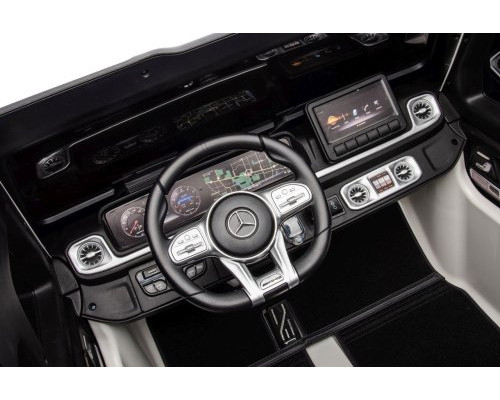 Дитяча акумуляторна машинка Mercedes Benz G63 AMG XXL Біла Дитяча акумуляторна машинка Mercedes Benz G63 AMG XXL Біла