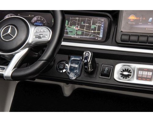 Дитяча акумуляторна машинка Mercedes Benz G63 AMG XXL Біла Дитяча акумуляторна машинка Mercedes Benz G63 AMG XXL Біла