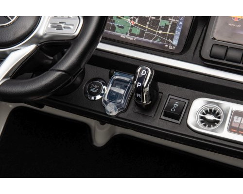 Дитяча акумуляторна машинка Mercedes Benz G63 AMG XXL Біла Дитяча акумуляторна машинка Mercedes Benz G63 AMG XXL Біла